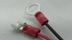 Pre Insulated Terminals On Cable. Red Ring 4.3mm & Female Spade 6.6mm Connectors 0.5 â€“ 1.5mm Conductor Size. Crimped With Ratchet Crimping Tool